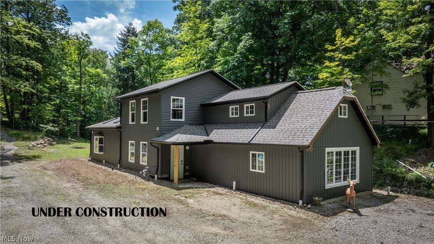 Welcome to 6373 Bunker Rd, North Royalton, where your dream home awaits on nearly two private, densely wooded acres. This pristine plot of land has been thoughtfully prepared, with the original structure demolished to make way for a brand-new construction that seamlessly blends modern luxury with the natural beauty of the surroundings. The new construction is nearly complete, offering a unique opportunity for the new buyer to put the finishing cosmetic touches on this stunning residence. Imagine creating a personalized space that reflects your style and preferences, set in a tranquil, secluded environment. Don’t miss this rare opportunity to own a custom home on a stunning plot in North Royalton. Embrace the chance to finish the details to your exact specifications and create a sanctuary that is uniquely yours. Contact us today to schedule a private showing and start the journey to your dream home.