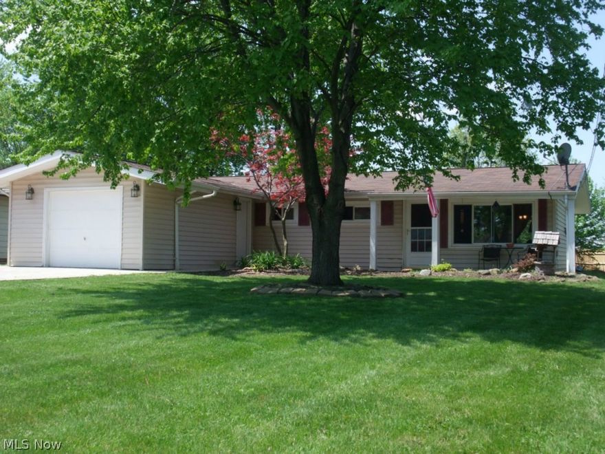 Well cared for and nicely updated 4 bedroom ranch with 2 full baths.  Freshly painted interior with wood laminate floors in living room, hall and all bedrooms installed in 2011.  The living room and dining area have vaulted ceilings giving it an airy feeling.  The kitchen offers oak cabinets, ceramic floors and all appliances stay.  All new doors throughout, all light fixtures have been updated as well.  In 2012, the larger bath was remodeled and the smaller bath remodeled in 2014.  Ceramic floors are featured in both baths and well as laundry room.  The newer drive was expanded to accommodate 2 cars and a great sized patio (14x28) was added in 2013.  Semi private fenced backyard.  This home is a short walk to the community playground and basketball courts.