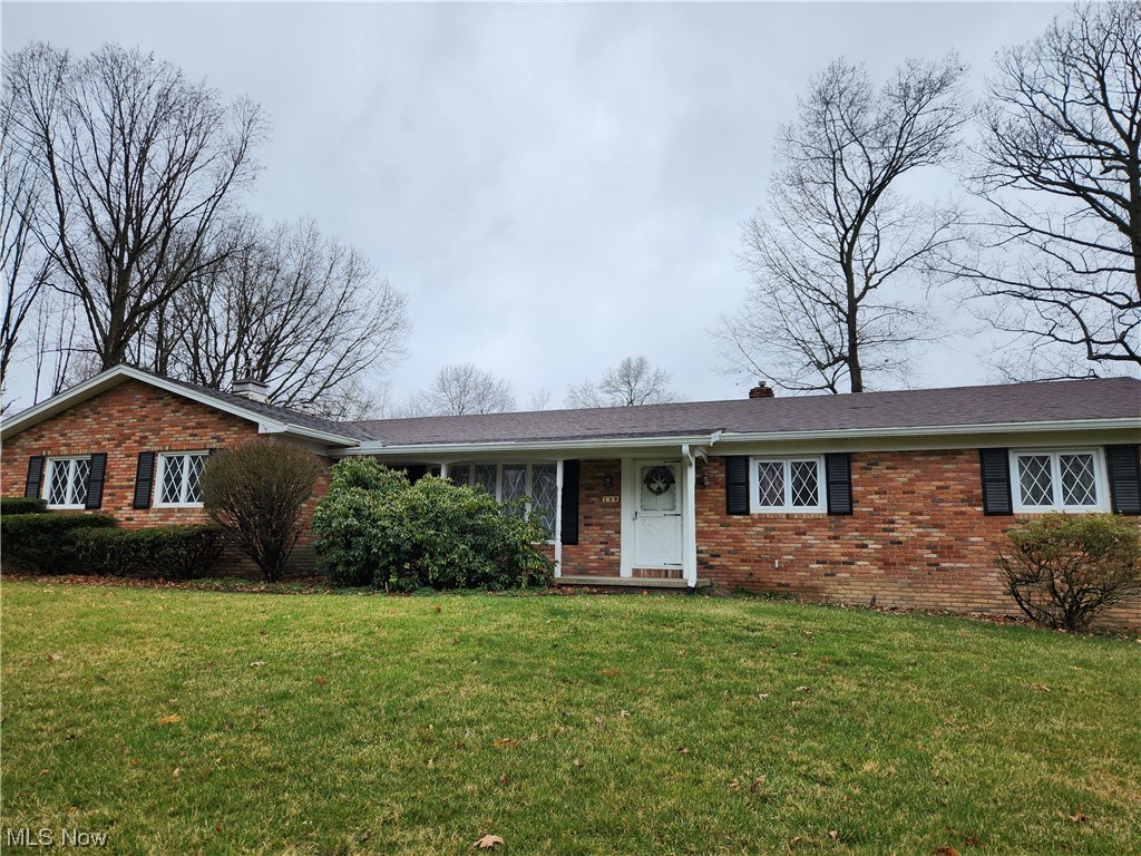 Wonderful 3 bed 2 bath brick ranch on dead end street! Formal living room, family room w/woodburning insert, beamed ceiling and enclosed sun room! 1694 sq ft plus additional 160 sun room! Full divided basement w/pool table that remains! 2009 roof, 2017 chimney liner,2019 patio door, 2020 well holding tank and gutters, 2021 gutter guard! Replacement windows! Double sinks in main bath! Shrubs in back are sellers. Estate, as is, seller to do no repairs.