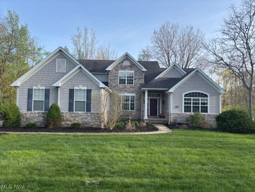 This gorgeous 4 bedroom, 3 bath Colonial built in 2004 sits on a private 1.49 acres in the highly prestigious Cherrywood Crossing Development, across the street from Greenleaf Park. First floor offers a spacious office and owner's suite, a two-story great room complete with gas fireplace, floor-to-ceiling, wall of windows and coffered ceilings. Chef's kitchen comes equipped with stainless steel appliances, granite countertops, and center island.  Tons of natural sunlight shine throughout this luxurious open concept build! An office, formal dining room (featuring tray ceiling), half bath and laundry room complete the first floor. Second floor houses three bedrooms and one full bath with double sinks. The newly finished, high-ceiling basement "masterpiece" (2020) includes over 1000 square feet of paradise living - including an exercise room, half bath and a state-of-the-art theater room. Outside area includes a multi-level deck (upgraded 2020), large newly fenced in back yard (vinyl fencing) (2020), basketball hoop, and trampoline and  offers spacious room in both front and back yards.  Plenty of storage area downstairs. Additional new updates from owners include a gas range (2023), dishwasher (2023), washer (2024), water pressure tank (2025), septic pump (2025), new paint on main/upper levels (2024) and a 30-year guaranteed shingle roof (May 2025) . Property shows like a brand new home! Call for a showing. Won't last long!