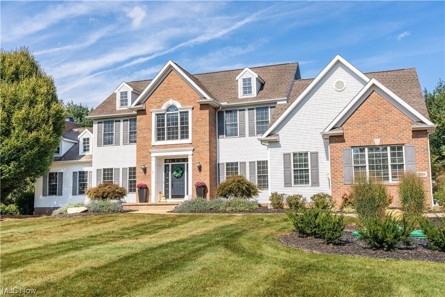 Must see this home. Great location. One mile from the Hartville Flea Market and Hardware. Convenient access to Akron, Canton, and Kent. HIGH QUALITY, CUSTOM BUILT! 4 bedrooms, 3.5 baths, 3 car garage and storage shed on 1.68 acre lot! Finished lower level with egress windows. Extra stairway in garage leads to the lower level. HUGE renovated kitchen, fully equipped with double ovens, center island, quartz counter tops, beautiful view from the large windows. Solid wood moldings and doors throughout the home! Great room is huge with beautiful fireplace, cathedral ceilings and octagonal sunroom! The dinette and sunroom both open up with french doors onto the patio. Part of the rear lawn is fenced-in with an iron fence. Entire lot is landscaped. Shed is located at the right rear of the property for tractors and gardening supplies. Fabulous and large master suite, with 2 walk-in closets, two vanities. Mostly finished lower level with a full bath. This is a wonderful home with large rooms, solid wood doors, crown moldings & quality throughout. Schedule your showing today.