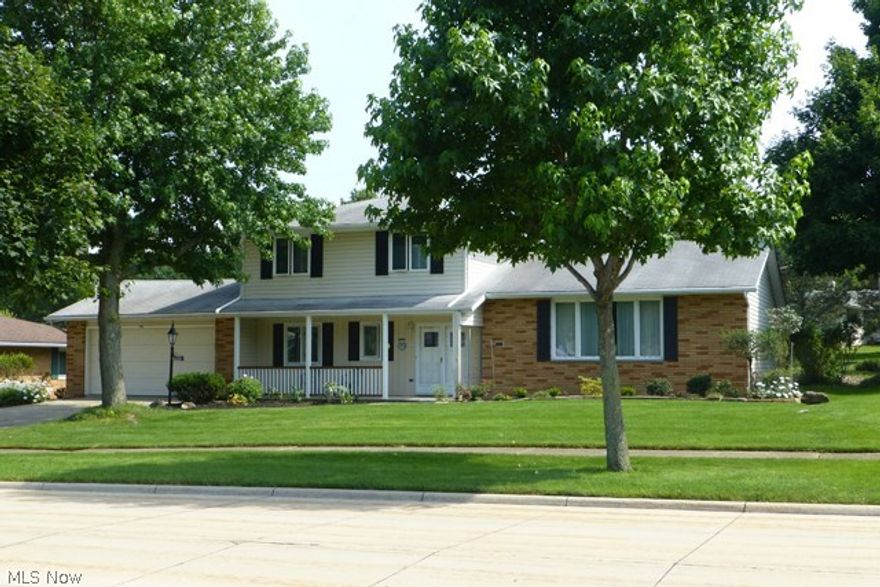 Beautiful 4 bedroom, 1.1 bath split level situated on a park-like setting!  Features an open floor plan and gorgeous hardwood flooring under the carpeting in the bedrooms, living, and dining rooms.  The spacious kitchen includes all appliances and is open to the family room.  The family room offers a wood burning fireplace and opens to a 3-season sunroom, perfect  for relaxing summer evenings.  There are 3 bedrooms on the upper level and a 4th bedroom/ office is on the 1st floor.  The basement includes a partially finished area and large laundry room with washer and dryer. Completing this offering is a 2-car attached garage, beautiful landscaping, Anderson windows (2010), and a welcoming front porch!