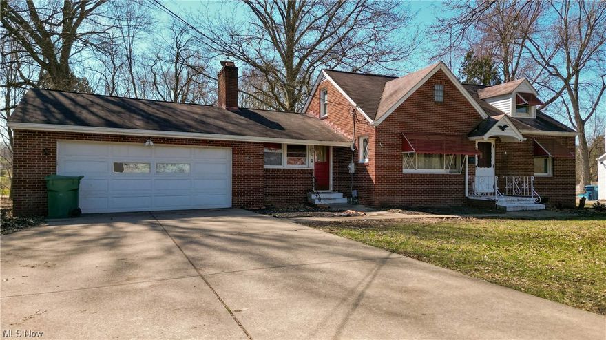 Investors take notice. Seller is selling property As Is. Brick bungalow with a two car attached garage.