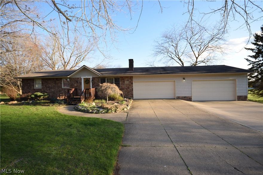 Beautiful Ranch with 3 bedrooms and 2 full baths, wood floors, huge gourmet kitchen, 3-level deck with one portion covered and hot tub, family room/sun room, full basement, mud room, tons of storage space, 4-car garage attached + 1 car detached in the 20 x 24 barn with extra storage.  You have to see this home to believe how beautiful and spacious it truly is! Flat lot with 270 feet of frontage which creates a very private feel given all the distance between neighboring houses. Recent updates include: roof(2000), high efficient furnace(2014), A/C(1999), water softener(2004), addition of extra attached garage and vinyl siding(2002), electrical upgrade(1997), upgrades to the kitchen including brand new counter-tops and large ceramic tile floor. Schedule your showing today! As soon as you step in the front door you'll find this one a great value!