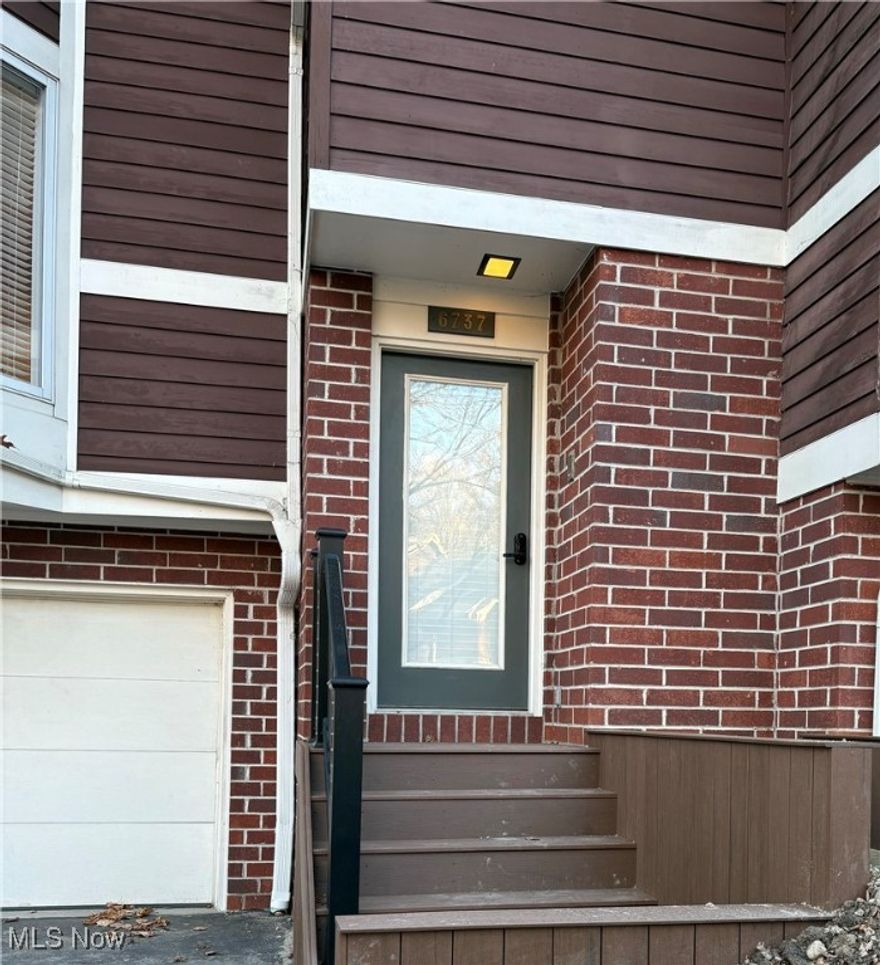 Welcome home to 6737 Old Royalton Road a beautiful Townhouse tucked away in Chippewa Creek with so many beautiful updates! The entrance steps have just been replaced with composite steps with wrought iron handrail, new hardwood in the foyer and throughout the kitchen, living room, dining room and steps leading to storage area and garage. The kitchen has all new cabinetry, clay backsplash, granite countertops, coffee bar, smart lighting with under cabinet lighting and all stainless steel appliances. The dining room has a beautiful chandelier with dimmer switch that leads into the living room with a large picture window and door that leads out into the deck, lots of natural light and privacy provided by the trees. Around the corner is a updated half bath and steps that lead to the garage and a hidden storage area. Up the freshly carpeted stairs with new wood handrail and wrought iron spindles to a nice loft area with skylight. Main Bedroom has a beautiful accent wall, skylight and its own private bath with walk-shower, new cabinetry, granite counter and ceramic tile flooring and walk-in closet! Second bedroom offers so much natural light from large window and full bathroom with new cabinetry, granite countertop, ceramic tile and a walk-in closet as well plus another closet! 
Smart Thermostat (Wyze) Key Pad Entry from front door- 2 Car deep garage with cabinets  Furnace/AC and Water Tank 4 installed 4 years ago. Coat Nook has a hidden storage area. 
Call your favorite Realtor for a private showing!