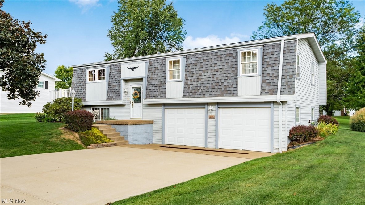 Charming split level home located in Oakwood North, Tri-Valley Schools! This one-owner home is very well maintained and move in ready. The home offers 3 bedrooms, 2 full baths, a large, 3-leveled deck, and a spacious family room in the lower level. You will enjoy the natural light that streams in through the windows, the vaulted ceiling with beams, hardwood flooring in kitchen, bedrooms, and entry way, and solid doors. Updates include a new furnace and central air, freshly painted decks, and 2 new sliding doors and windows in the living room and kitchen area. Call to set up your showing today!