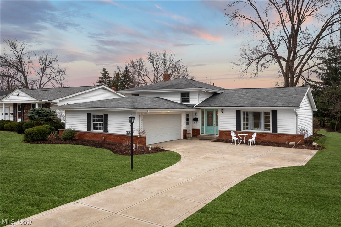 This MOVE IN READY split level North Olmsted home has been meticulously redesigned and remodeled in a classic & luxurious style. The 2,383 square feet is home to 4 beds and 3 bathrooms. Entering through the accent colored front door, you are immediately greeted by thin plank hardwood floors and clean white walls. The heart of this home, the formal dining room, has been accented with white wainscoting & satin finish wall paper. A truly wonderful space for entertaining! The kitchen boasts blonde cabinets, stainless steel appliances, & crystal hardware. The large family room makes a great gathering space and has been updated with new tile flooring, woodwork, paint, and modern light fixtures. All bathrooms in this home have been fully renovated and feature an array of subway & marble tiles. The private patio has plenty of room for a large outdoor furniture set + grill and the backyard leaves plenty of room for endless outdoor activities. Entering through the garage leads into a wish list m