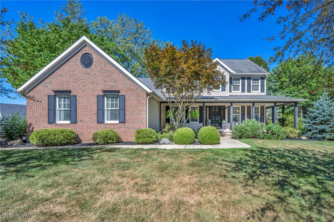 Located on a quiet street in the Cali Woods community of Concord Township, this beautiful & well-maintained Colonial sits on 2.18 acres & offers a rare combination of neighborhood living & parklike privacy. The home is designed for both comfort & flexibility, with 4 bedrooms, including a 1st-floor primary suite, 2.5 baths & over 4,613 sq ft of living sq ft w/ a finished basement. Outdoor living shines w/ a wrap-around front porch, deck, brick paver patio & a hidden trail that leads to a wooded fire pit area. An eat-in kitchen features granite countertops, stainless steel appliances, center island & dinette w/ access to the deck, and opens to a vaulted family room w/ dramatic floor-to-ceiling fireplace. A butler’s pantry connects to a large flex room, ideal as a media room, formal living space, or multipurpose retreat. The first-floor primary suite includes a tray ceiling, walk-in closet & spa-like en-suite bath w/ jetted soaking tub, double vanity & walk-in shower. Upstairs, all bedrooms have walk-in closets, plus there’s a finished room above the garage for a gym, office, or hobbies. The finished basement provides even more recreation & living space. Additional highlights include a 1st-floor laundry/mudroom & 3-car garage w/ extended parking pad, crafted brick chimney and a shed. Recent updates include: Replaced roof (2012), washer/dryer (2020), all kitchen appliances (2015), water heater (2017), sump pump (2018), installed granite countertops & replaced sink, garbage disposal & light fixtures in kitchen (2015), installed maple cabinetry, beverage refrigerator, stainless bar sink & granite countertops in butler's pantry, added 1st-floor laundry/mud room, updated guest bath, installed tile flooring & crown molding in media room, and more. INCLUDED are ALL kitchen appliances, washer/dryer, beverage refrigerator, porch swing, security system & all window treatments. Conveniently located nearI-90, OH-44, shopping, restaurants, parks, and other local attractions.