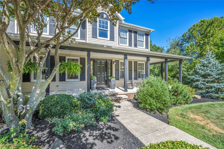 Located on a quiet street in the Cali Woods community of Concord Township, this beautiful & well-maintained Colonial sits on 2.18 acres & offers a rare combination of neighborhood living & parklike privacy. The home is designed for both comfort & flexibility, with 4 bedrooms, including a 1st-floor primary suite, 2.5 baths & over 4,613 sq ft of living sq ft w/ a finished basement. Outdoor living shines w/ a wrap-around front porch, deck, brick paver patio & a hidden trail that leads to a wooded fire pit area. An eat-in kitchen features granite countertops, stainless steel appliances, center island & dinette w/ access to the deck, and opens to a vaulted family room w/ dramatic floor-to-ceiling fireplace. A butler’s pantry connects to a large flex room, ideal as a media room, formal living space, or multipurpose retreat. The first-floor primary suite includes a tray ceiling, walk-in closet & spa-like en-suite bath w/ jetted soaking tub, double vanity & walk-in shower. Upstairs, all bedrooms have walk-in closets, plus there’s a finished room above the garage for a gym, office, or hobbies. The finished basement provides even more recreation & living space. Additional highlights include a 1st-floor laundry/mudroom & 3-car garage w/ extended parking pad, crafted brick chimney and a shed. Recent updates include: Replaced roof (2012), washer/dryer (2020), all kitchen appliances (2015), water heater (2017), sump pump (2018), installed granite countertops & replaced sink, garbage disposal & light fixtures in kitchen (2015), installed maple cabinetry, beverage refrigerator, stainless bar sink & granite countertops in butler's pantry, added 1st-floor laundry/mud room, updated guest bath, installed tile flooring & crown molding in media room, and more. INCLUDED are ALL kitchen appliances, washer/dryer, beverage refrigerator, porch swing, security system & all window treatments. Conveniently located nearI-90, OH-44, shopping, restaurants, parks, and other local attractions.