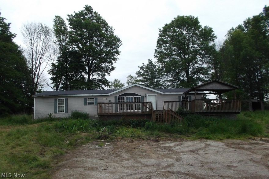 Ranch style manufactured home on 5 acres has 3 bedrooms and 2 full baths. A Portion of the property is in a flood zone.  Use Caution when entering home there is some deteriorating flooring. Location of Septic is unclear. To be Sold AS IS - No Disclosures - Any Room sizes are approximate and not guaranteed - Seller will NOT pay for any inspections - Condition of any appliances are not warranted - This is a CASH only sale property - Verification of funds required.  Buyer or buyers agent responsible to for due diligence, inquiry of all property information and property suitability for intended use. To be sold via an On-Line Marketing Event. Start date 11/11/2017 and Ending on 11/16/2017.