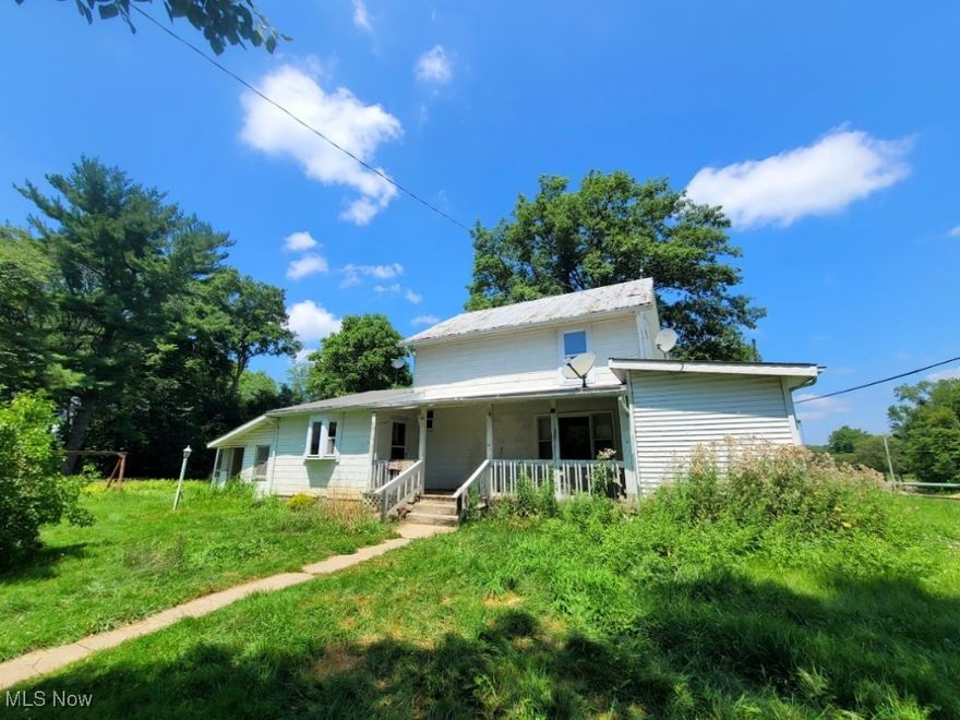 This 4-bedroom home backs up to the Kipton Reserve in the Metroparks, offering beautiful natural views. Sold as-is, it features a spacious family room with a large fireplace. With tons of potential, it's a great opportunity to make it your own