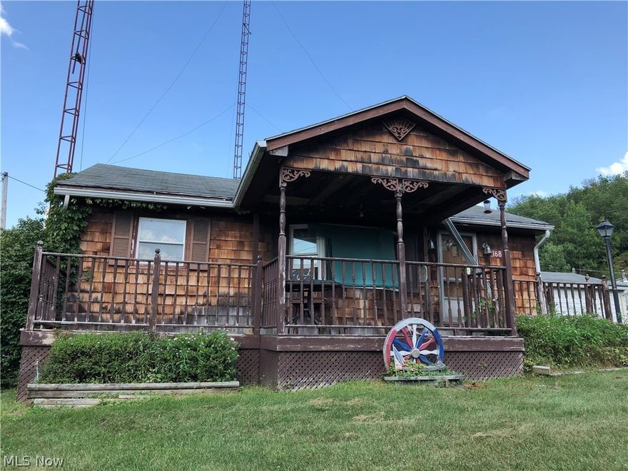 Two bedroom, 1 bath home on 0.62 acre lot.  Full unfinished basement.