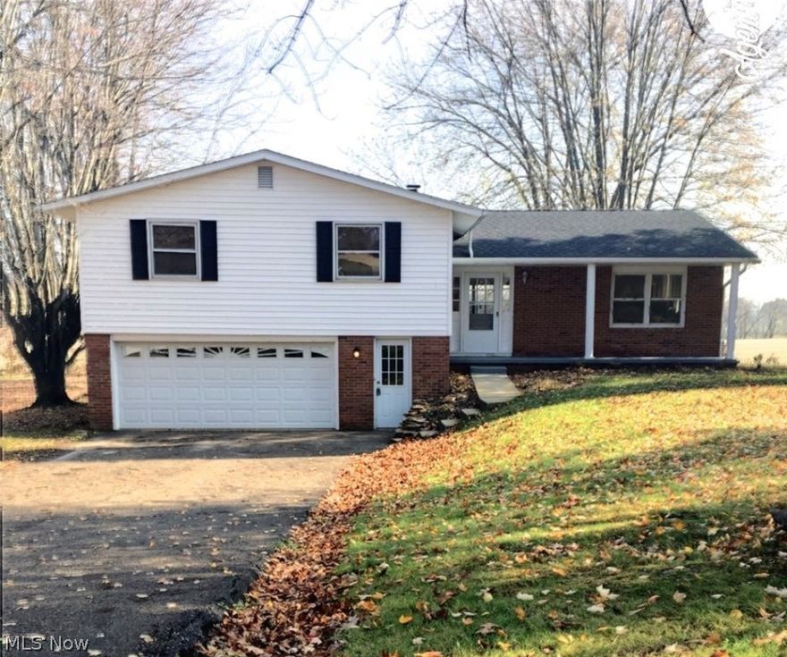 Completely Updated 4 Bedroom 2.5 Bath Split level in North Canton Schools. Quiet country setting with large lot overlooking a field. New kitchen with breakfast bar, stainless appliances, and plenty of cabinet space. Large living room open to kitchen area. Master bedroom with a slider leading to a large deck. Master bath has double sink vanities and tiled shower with walk in closet. Three additional bedrooms on second level. Family room in walk out basement with a slider to backyard. Half bath in lower level. Large unfinished basement area with plenty of storage. Two car garage. New Roof 2014.