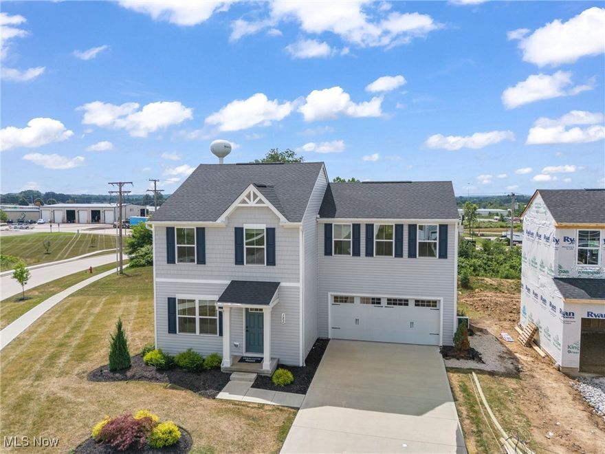 Welcome to 182 Captain Trl in Bates Crossing. Used as the former Colton model home for the community, this property is packed with upgrades and move-in ready—no waiting, no building process, just step right into your new home! From the moment you arrive, you’ll notice the details that set this home apart: a fully installed yard with sprinkler system, lush landscaping, and a composite back deck perfect for outdoor living. Inside, the home comes fully applianced with stainless steel kitchen appliances, plus a washer & dryer conveniently located in the upstairs laundry. A Safe & Sound security system and a finished, drywall 2-car garage add even more value. This home offers an open and airy layout, perfect for both everyday living and entertaining. Step into the great room where luxury vinyl plank flooring flows throughout the first level. The eat-in kitchen is a chef’s delight with white soft-close cabinetry, a large center island, and a pantry. A sliding door leads to the private backyard and deck, while a half bath completes the main floor. Upstairs, you’ll find 4 spacious bedrooms—three with walk-in closets. The primary suite features an ensuite bath with double sinks, while the second-level laundry makes life easy and efficient. The lower level provides plenty of storage space and is roughed in for a future bathroom, offering room to grow. This is a rare opportunity to own a never-lived-in home with all the extras already in place. Don’t wait—schedule your private showing today and experience everything this Bates Crossing beauty has to offer!