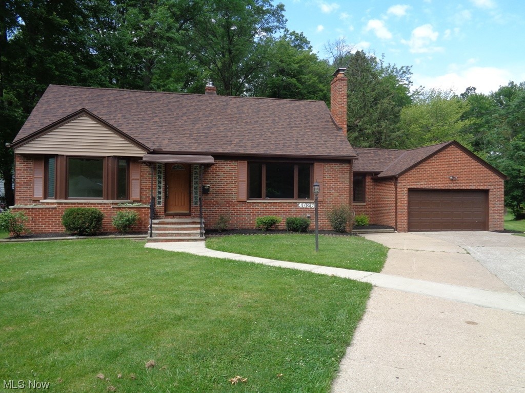 Wow, what beautifully updated all brick 4 bedroom, 1.5 bath home with a finished basement! Owner will provide all lawn maintenance, landscaping & snow removal in monthly rent! One of the nicest and energy efficient homes available for rent! Park-like wooded views! Home has been completely redone inside and out with updated kitchen including stainless appliances, updated baths with tile floor and marble surround, new windows, new roof, new carpet 1st floor, all wiring updated and rerun, PVC plumbing, new duct work to provide correct heating and air conditioning to home (even 2nd floor), new 6 panel doors and all LED light fixtures, carpet & newer High Efficiency HVAC. First floor offers 2 spacious bedrooms and the 2nd level has 2 more well sized bedrooms. 1st or 2nd floor main bedroom! Living space on 1st floor has large front window and fireplace. Finished living space in the basement also has a fireplace. Dining area provide scenic views of wooded park like yard. Kitchen offers ample counter and cabinet space for any chef! Breezeway that can double as a sitting area lead to attached 2 car garage! Basement offer a nice additional finished living space, more storage than one can ask for plus a laundry area! Outside you have a large deck to relax and enjoy the views of the beautiful yard. Double wide drive way! Close to shopping & restaurants. Call today!