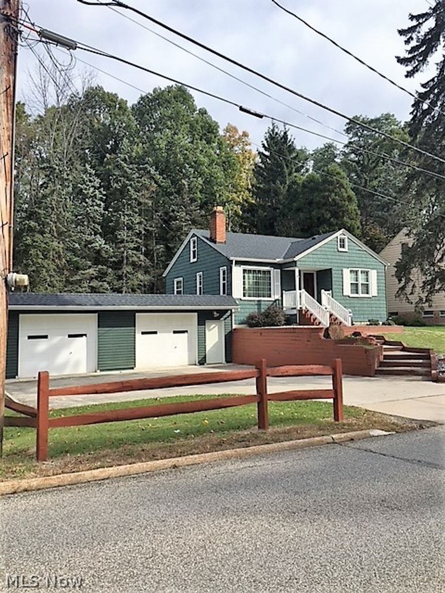 IN 2008 ALL OF THE INTERIOR OF THE HOME WAS REBUILT. .SIDING,WINDOWS & INSULATION DONE IN 2010. CONCRETE DOUBLE WIDE DRIVE DONE IN 2011.A SECOND STORY CAN BE ADDED TO THE TOP OF THE GARAGE PER SELLER.GLASS BLOCK WINDOW. THE BASEMENT FAMILY ROOM CAN BE USED AS A BEDROOM.THE GARAGE IN OVERSIZED AT 24X34 FEET.ELECTRICAL CIRCUIT BREAKER BOX IS NEWER.GARAGE DOOR OPENER.DRAIN ACROSS THE FRONT OF GARAGE.GREAT STARTER OR RETIREMENT HOME.HARDWOOD FLOORS IN BEDROOMS AND LIVING ROOM.FIREPLACE IN LIVING ROOM.LANDSCAPED FRONT YARD WITH RETAINING WALL.IN THE SAME FAMILY SINCE 1960.