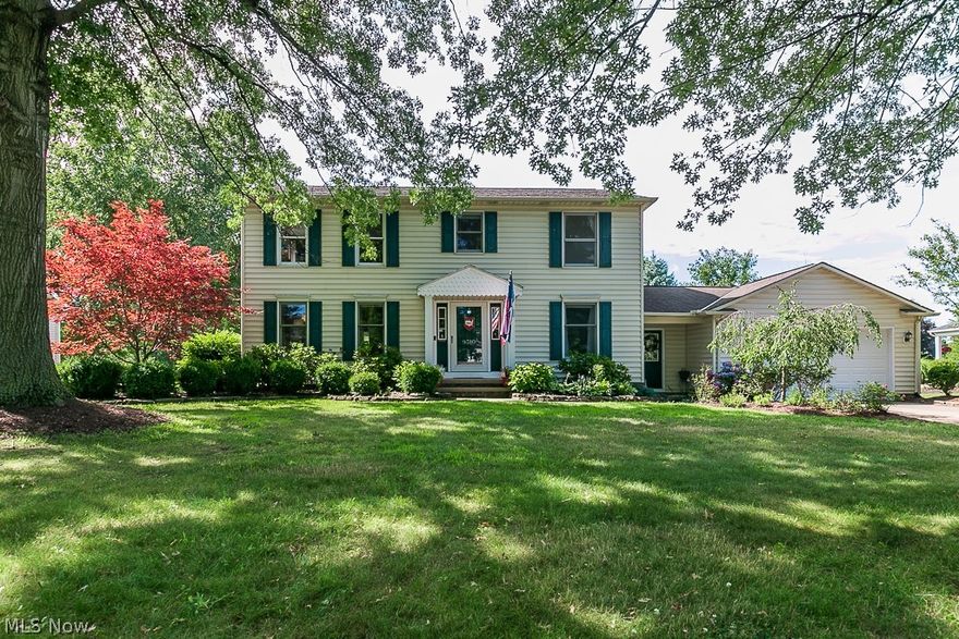 Spacious colonial in convenient Mentor location! This home features gorgeous hardwood floors throughout the first floor. The layout is open and flows well with generously sized office, dining room and family room. The large eat in kitchen includes all appliances. Off the family room is a bright sunroom that leads to a deck overlooking a large backyard. The property backs up to a stocked pond and includes its very own pirate ship at the water’s edge and castle themed playhouse. The master bedroom has an attached bath and walk in closet. The additional bedrooms are nicely sized and share an updated bathroom. The home also has a first floor laundry and a partially finished basement.  A new HVAC system was installed 7 years ago, and there is also a sprinkler system and Invisible Fence.