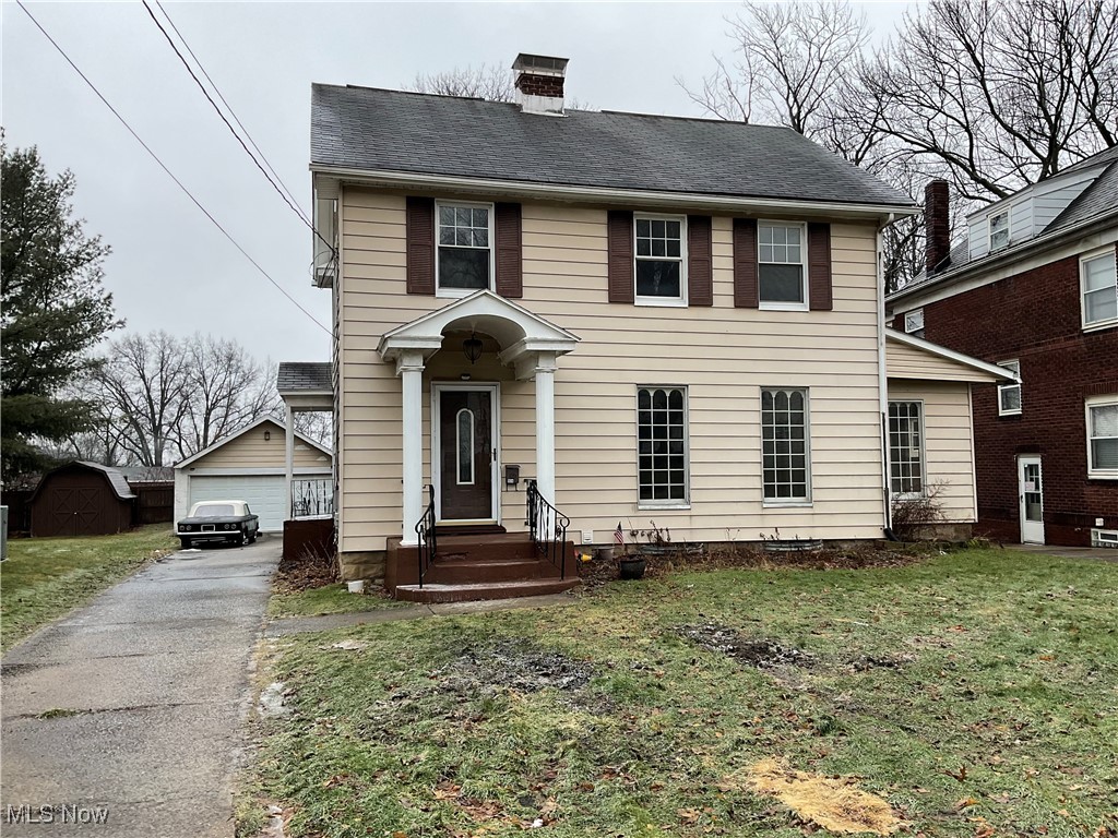 Some old world charm in 3 bedroom 1.5 bath with possible 4th bedroom in attic colonial, side porch two decorated fireplaces, 2 car detached garage, updated oak kitchen, large living room and formal dining room, full bathroom. All of this can be your, schedule you showing today