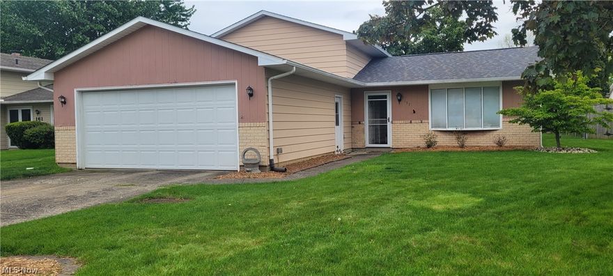 Delightful split-level home with great potential and plenty of space to make it your own! Step outside from the dining area through the newer patio door (2019) to enjoy a fenced backyard and deck - perfect for relaxing, entertaining, or spending time outdoors. 

Inside, you'll find updated appliances (2019), a RainSoft water softener system installed in (2023), and a spacious lower-level family room featuring a cozy fireplace. The lower level also includes a bonus room and convenient laundry area. 

All bedrooms are located upstairs, offering added privacy along with generous closet and storage space. Additional updates include a newer garage door (2022) and a new roof (2026).  

This home is ready for its next owner to add their personal style and finishing touches!