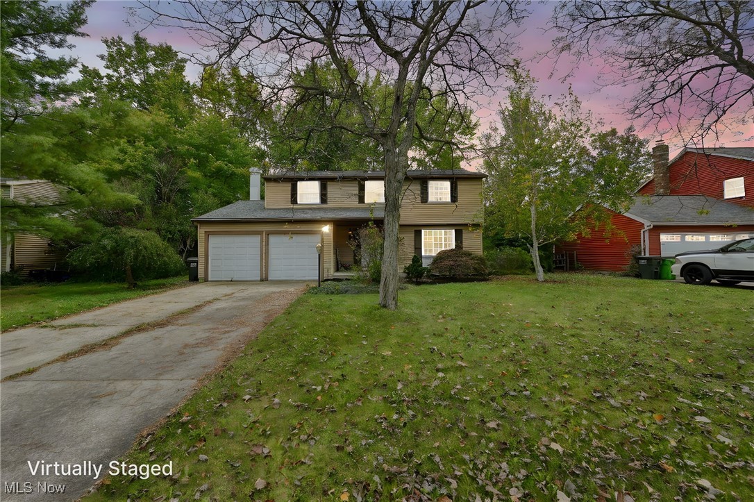 Discover the ultimate family home in this quiet neighborhood and a stunning Colonial, nestled in the Stow school district. With its two-car attached garage, beautifully updated main level featuring New Hickory hardwood floors, a fully updated kitchen with new Kraft made cabinets, Granite countertops, new appliances, and an open concept to the large family room with a wood burning fireplace, Formal dining room with a large living room, and a half bathroom on the main level, this home is a true showstopper. The second floor boasts a spacious 23x16 Master bedroom with a large walk-in closet and master bathroom, three nicely sized bedrooms, and a full bathroom for kids or guests. The basement is partially renovated with a 22x14 rec room Bar, large laundry room with a laundry chute from the second floor, and a large storage room for all your extra belongings. Outside, enjoy beautiful landscaping, a patio, partially fenced in yard, and stunning mature trees providing a serene escape from the sun. This home is perfect for families seeking a warm and inviting living​​‌​​​​‌​‌​​​‌‌​​​‌‌‌​​‌​​‌‌​​​​ space.