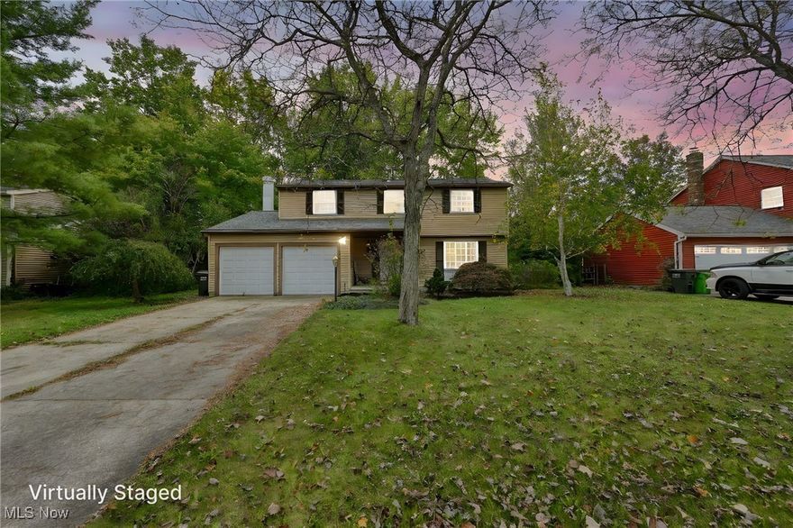 Discover the ultimate family home in this quiet neighborhood and a stunning Colonial, nestled in the Stow school district. With its two-car attached garage, beautifully updated main level featuring New Hickory hardwood floors, a fully updated kitchen with new Kraft made cabinets, Granite countertops, new appliances, and an open concept to the large family room with a wood burning fireplace, Formal dining room with a large living room, and a half bathroom on the main level, this home is a true showstopper. The second floor boasts a spacious 23x16 Master bedroom with a large walk-in closet and master bathroom, three nicely sized bedrooms, and a full bathroom for kids or guests. The basement is partially renovated with a 22x14 rec room Bar, large laundry room with a laundry chute from the second floor, and a large storage room for all your extra belongings. Outside, enjoy beautiful landscaping, a patio, partially fenced in yard, and stunning mature trees providing a serene escape from the sun. This home is perfect for families seeking a warm and inviting living space.