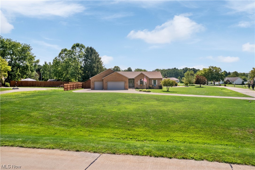 Welcome to this custom built and sprawling all brick ranch located on a beautiful lot. This inviting abode offers three nicely sized bedrooms and three full baths. The oversized great room boasts a beautiful gas fireplace and bamboo flooring. The kitchen has cherry cabinetry, black appliances, and has ample counterspace. The dining area has sliders that exits to the stamped concrete patio with a pergola. There is also an additional living room that overlooks the stunning backyard. The basement is huge and could easily be finished for a rec room. There is already a full finished bathroom in the basement. All of this plus a 3 car attached and heated garage and a separate shed. This home has been lovingly maintained and is awaiting a new owner. Updates include roof in 2022 and HVAC in 2023. This one is a show stopper. Call to schedule a showing today to make this your new address!!