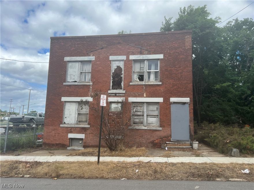 All brick double around the corner from The Opportunity Corridor.  Convenient location minutes from Downtown, Tremont, and University Circle.  This property requires a full cleanout and rehab.  Great cash cow opportunity for experienced rehabber with vision.  As is sale.