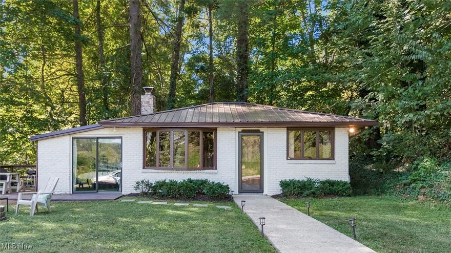 Lakefront Mid-Century Modern Retreat – Turnkey Short-Term Rental Opportunity!

Discover this stunning one-bedroom, one-bath mid-century modern ranch nestled along the serene waterfront. This charming home is more than just a peaceful retreat – it’s a proven profit-generating property with a strong track record on short-term rental platforms.

Step inside to find a thoughtfully designed interior featuring clean, modern lines, large windows, and abundant natural light, perfectly blending indoor comfort with the natural beauty outside. The open layout creates a warm and inviting atmosphere, ideal for a weekend getaway or year-round living.

Enjoy breathtaking lakefront views and incredible wildlife watching right from your front yard. With the option to rent a nearby boat dock, outdoor enthusiasts will love the access to boating, fishing, and water sports. Relax on the patio with your morning coffee, or unwind by the water or in the hot tub after a day of adventure.

Whether you’re searching for a primary residence, a private weekend escape, or an income-producing investment, this property checks all the boxes. Don’t miss your chance to own this peaceful lakefront gem that offers both lifestyle and financial rewards.