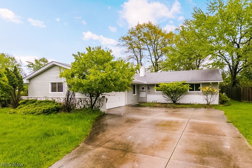 What a great opportunity in highly regarded North Royalton!  This classic, charming 3 bedroom, 2 bath ranch on nearly half an acre features a spacious eat-in kitchen and comfortable living room with WBFP, and sliders out to the covered patio leading out to a serene, wooded, picturesque backyard! Bring your imagination to this solid opportunity right in the heart of a community boasting an award winning school district! Minutes from retail, recreation, public transportation, I-77, I-71, and the OH Turnpike.  Call today for a showing. This home won't wait. You shouldn't either.