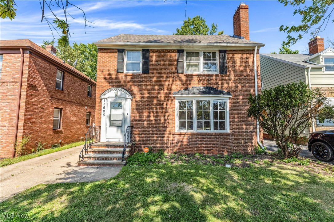 Step into this stunning brick colonial in the heart of University Heights, a home that exudes timeless charm and exceptional curb appeal! The inviting living room welcomes you with built-in shelving, a cozy fireplace with a classic mantel, and gorgeous bay windows that fill the space with natural light while overlooking the beautifully landscaped front yard. The formal dining room offers the perfect setting for family gatherings and entertaining friends. The bright and spacious kitchen features abundant cabinets and counter space, a refrigerator, and a charming dining nook that’s ideal for casual meals. Relax in the enclosed three-season room, surrounded by windows that create a serene and sun-filled retreat. Upstairs, you’ll find two comfortable bedrooms and a full bathroom, including one bedroom with access to a private balcony—a perfect spot to enjoy your morning coffee or unwind in the evening. The expansive third-floor bedroom offers versatility and comfort, complete with its own half bathroom, whether used as a home office, guest suite, or additional living space. The fully finished basement adds even more living space and includes a separate laundry area for convenience. Central air ensures comfort year-round, and a two-car detached garage completes this wonderful home. Located in the heart of University Heights, this home offers easy access to John Carroll University, local dining, and shopping, as well as major highways for a seamless commute. Enjoy nearby cultural and recreational attractions such as the Cleveland Museum of Art, the Cleveland Museum of Natural History, and Shaker Lakes Park. With nearby healthcare centers including University Hospitals Cleveland Medical Center and the Cleveland Clinic, and a vibrant neighborhood, this University Heights colonial combines classic elegance with modern convenience, making it a place you’ll be proud to call home. Don’t miss the opportunity to see this exceptional home in person—schedule your showing today!