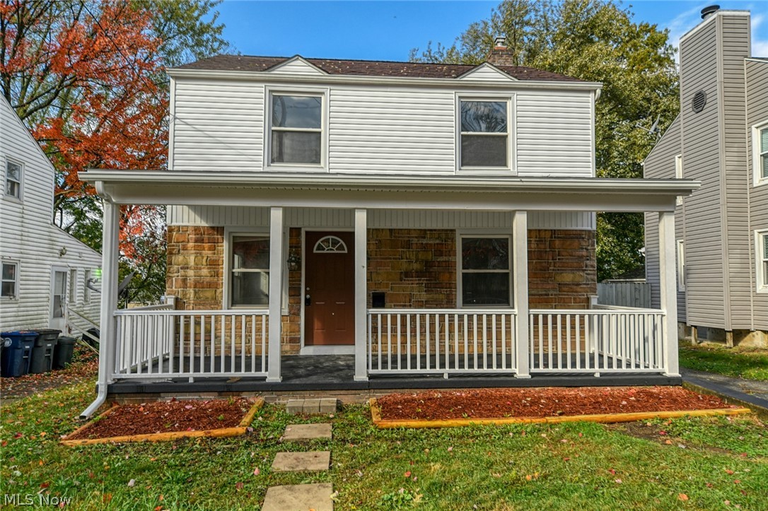 Stunning Firestone Park remodel! This traditional Akron colonial now fits a current buyers needs. The open floor plan connects the massive living room to the formal dining room. It flows nicely right through to the all new kitchen and wonderful bonus room! A convenient half bathroom has been added and is brand new on the main floor with ceramic flooring. Rustic wood look laminate flooring runs through the main level. The kitchen offers classic white cabinetry, marble look counter tops and brushed bronze hardware that ties into the wood topped breakfast bar island! The bonus room on the main floor has endless possibilities and can be used as an office, a play room, or an additional family room! Upstairs you will see all brand new carpet that runs through each bedroom. The 3 bedrooms upstairs are a great size that offer nice closet space! The upstairs bathroom has a new vanity and ceramic flooring. Step outside to a freshly painted deck and notice the fresh new landscaping and lighting,