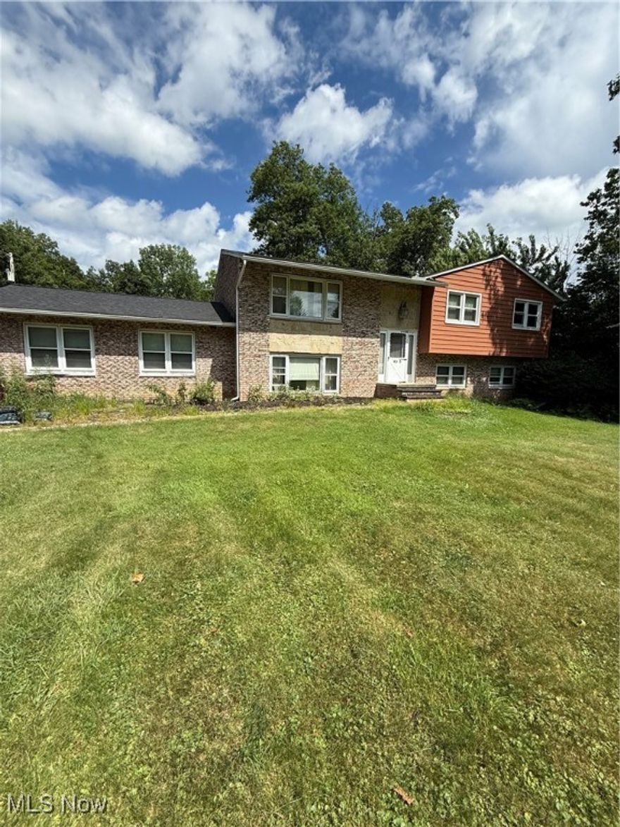 This property has great bones and lots of space featuring 4 bedrooms 2.5 bathrooms with an in suite master bathroom.  Plenty of space on the first floor with vaulted ceiling in living room, open dining area and a huge finished walk out basement.

The roof is 5 years old, the mechanicals are in great shape consisting of a high efficiency gas furnace and central air conditioning,  The hot water tank is in great condition.

It is priced to sell "AS IS" at $245,000 or you can buy it totally remodeled at $335,000 and pick out your finishings.

I am excited for a young family to take advantage of the low price and make it their own!

The listing agent has an interest in this property as well as a construction company.  Buy as is and put your own sweat equity in and save a lot of money or have me remodel it for you. It is priced as is and needs your creative touches to freshen it up.

This property will come with a 1 year home warranty from AHWP.