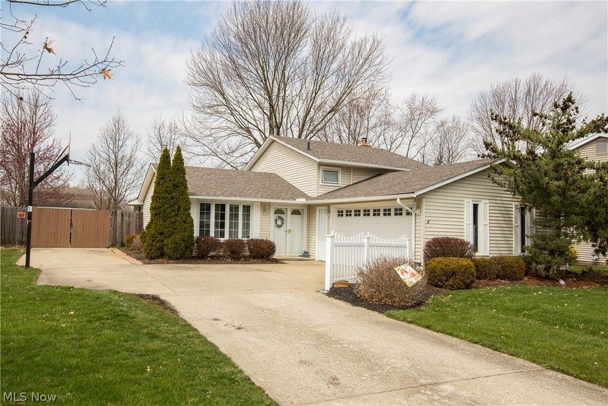 Get A Move On...This large, well-maintained North Ridgeville split level home has it all! Greet and entertain guests in the open first floor, with fresh colors and newer bay window.  The kitchen (updated 2017) serves as your hub with ample granite countertops and extensive cabinet space.  The floor plan from the kitchen flows nicely to both the living and dining rooms. A sun room addition (2009) on the back provides a great seating area and opens to the quaint and private patio. The private second floor includes owner's suite with updated shared bath, and two more generous bedrooms! Other updates include: new windows throughout, lighting and fixtures (2016).  Discover the lower level with stately fireplace in the family room with new carpet, full bathroom, laundry room & utility room. An additional lower level room can serve as a fourth bedroom, children's playroom, home office, or home gym - you decide! Outside, enjoy the afternoon sun on your serene back patio! And the fenced-in back