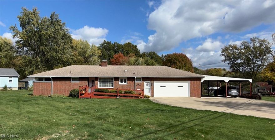 Beautifully maintained all-brick ranch situated on a 222' x 150' double corner lot with the convenience of City utilities in the Howland Local School District. This quality-built home offers 3 main-floor bedrooms with hardwood floors and 2.5 baths with walk-in showers. Enjoy a spacious living room with built-in cabinetry, birch trim, and plastered walls showcasing timeless craftsmanship. The home features two full kitchens—one on the main floor and another in the finished basement with appliances included. The lower level is a finished basement which includes a rec room with fireplace, a 4th bedroom, a laundry area with newer washer and dryer, new double wide laundry tub, and a workshop. The multiple mounted TV's stay. Outside, you’ll find a double attached garage, a 25' x 24' carport, a large 20' x 16' shed, and an extra-wide driveway providing ample parking. Enjoy peace of mind with a Generac whole-house generator (just over 2 years old) and a newer furnace. You will want to make this your next home!