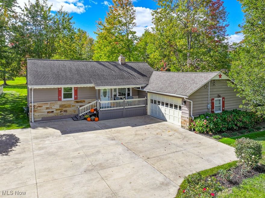 This well maintained ranch in Mayfield Village sits on over half an acre, offering a peaceful setting with the convenience of one floor living! Inside, you'll find a cozy living room with a wood-burning fireplace and laminate flooring that flows into the dining room, where a sliding patio door opens to the covered deck—perfect for outdoor meals. The updated kitchen features a subway tile backsplash, is fully equipped with appliances, and leads to a handy first floor laundry room, a half bath, and access to the attached two car garage. Both bedrooms offer generous closet storage and easy access to a beautifully updated full bath. A full basement adds potential to finish for extra living space plus plenty of room to store belongings. Outside, you'll appreciate the spacious deck with views of the park-like backyard, a great place for kids and pets to play. Whether you're a new buyer or ready to downsize, this picture perfect home close to major freeways, metro parks, shopping, The Grove, and Hillcrest Hospital is one to see.  Schedule your showing today!