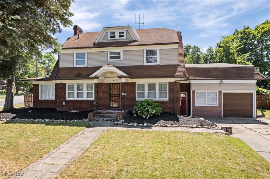 Welcome to this stunning, spacious, character-filled colonial home you've been waiting for! With 5 bedrooms, 3.5 baths, and multiple living areas, there’s room for everyone to live, work, and play. The main floor features an eat-in kitchen with granite countertops, newer windows, and access to a private, fully fenced backyard. The kitchen flows into a spacious bonus room with its own front entrance and direct access to the attached garage—perfect as a playroom, mudroom, or flex space. Original hardwood floors and large windows bring warmth and natural light into the formal dining room, expansive living room, and cozy sitting room/den. A sunroom at the back of the home includes new carpet, window blinds for privacy, and a direct walk-out to the backyard. A full bath is conveniently located just off the front foyer. Upstairs, the second floor offers a large primary bedroom, two additional bedrooms, and a full bathroom. The third floor provides two more bedrooms and another full bath—perfect for a growing family, guests, or a home office setup. Fresh, neutral carpeting enhances the 2nd and 3rd floors. The finished basement expands your living space even more with a large rec/media room, two additional finished rooms ready to suit your needs, a laundry/utility room, and a convenient half bath. This home is full of charm and space, located just across from Buchtel High School and close to the bus line, library, grocery stores, and local shops. It’s also minutes from Summit Mall, downtown Akron, and the University of Akron. Updates include: Fresh paint, carpet and landscaping!