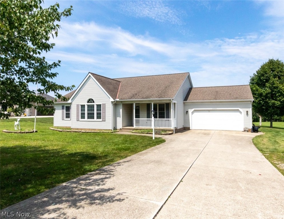 This sweet ranch home is the one you've been waiting for! Easy one floor living on an acre of land! Stepping inside to a gracious foyer, you immediately see beautiful finishes that make this home special... Living room with cathedral ceiling and beautiful fireplace will be the spot for you to relax and enjoy the view of the back yard... the country kitchen has an abundance of cabinetry, a super-convenient island, and plenty of room for casual seating by the large sliding doors leading to the back deck. For special occasions or just special meals with your closest loved ones, the dining room - with its warm natural light and glowing hardwood floors - will be perfect for those wonderful memories to be made. The enormous master bedroom will be your personal spot for respite from the hustle and bustle of busy days - space for a cozy spot for reading, yoga, or a spinning session. A walk-in closet and en-suite bathroom, complete with a walk-in shower, complete it. The master bedroom as well