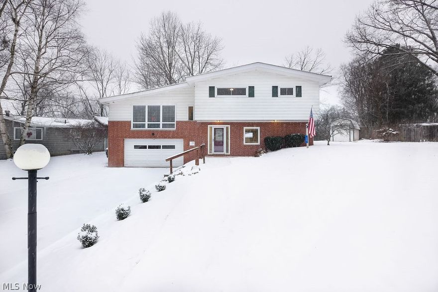 This almost fully remodeled, open floor plan, modern split level home will be hitting the market on Monday January 14th! The home has high ceilings in the great room and kitchen and when combined with lots of windows, the home has a lot of natural light that fills it. The homeowners have put a lot of love and care into updating this home including most recently (2019) a brand new and very trendy full bath on the first floor as a new kitchen floor. Just some of the other updates include full remodel of upstairs full bath in 2014, a brand new laundry room with built in storage, the deck has been painted, front has been landscaped, trim throughout has been replaced and even the walls are fresh and clean ready for your artwork and pictures, as all of the walls been refinished (skim coated) and painted so as a result they look new! The only thing this home is missing is you! #WelcomeHome!