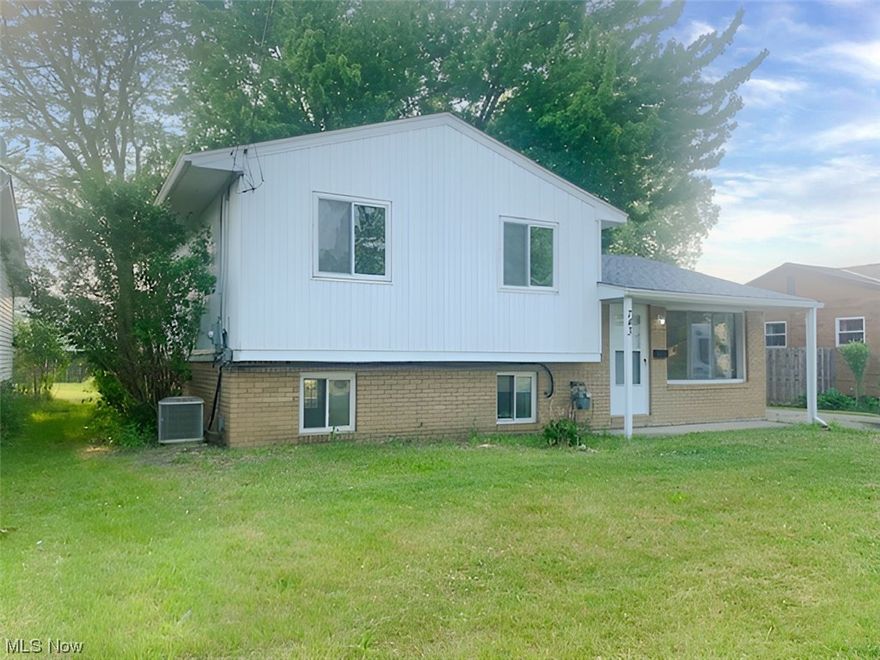 YOU GOTTA SEE THIS!!!!! Updated Split Level with 3 bedrooms, 1.5 bath, deck, detached 2 car garage, with nice backyard and walkout lower level. Substantial improvements by owner include new roofs, updated baths, new kitchen cabinets and countertop, new laminate flooring in living room, family room dining and kitchen, new carpet in all three bedrooms, furnace, garage door, and newly painting throughout.