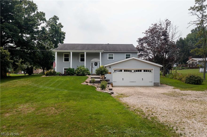 Welcome to 8682 Lynn Park, located on Marlington LSD. This charming bi-level home sits on a private, beautifully landscaped wooded 1.5-acre lot (two extra Lots included). The great room has built-in shelves, laminate flooring, and it's open to the dinette area. The kitchen offers white cabinets, appliances, tile flooring, a breakfast bar, and a dinette area with access to the large deck and private backyard, perfect for entertaining guests. The upper level has three bedrooms and a full bath (with double sinks & tiles backsplash). The lower level could be a family room or an In-Law Suite with a decorative fireplace and a whole separate kitchen with cabinets, cooktop, wall oven, refrigerator, a sink. A convenient full bath with a walk-in shower, the laundry room (same room) with lots of storage cabinets, and the 4th bedroom are on this level. There is a large mudroom/exercise room in between the laundry room and the attached two-car garage. Make your appointment for your private showing