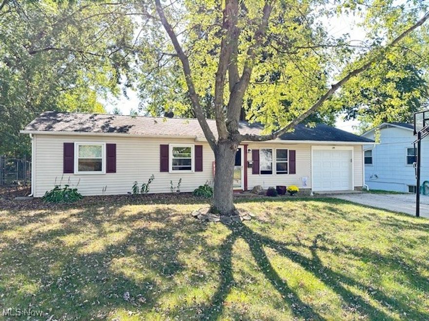Welcome to this fabulous all one floor living Ranch home!  Nice vinyl flooring throughout!  Super spacious kitchen with breakfast bar seating and offers great space to add an island or more cabinets, refrigerator and dishwasher included.  Kitchen, dining room and living room have an open concept feel!  Large bonus room in the back offers laundry and additional space for an office/family room/game room etc!  Back door leads to a fenced in spacious yard with a large concrete patio!  Trampoline doesn't stay but the playset, front basketball hoop and shed will convey!  Three bedroom home approximately 1584 square feet!   Attached garage for your convenience and comes with a built in heater and pull down storage! 
Central air, newer interior doors, newer windows and the furnace is about 2017 and the roof is about 11 years old!   Come take a tour, fall in love and move in before the Holidays!