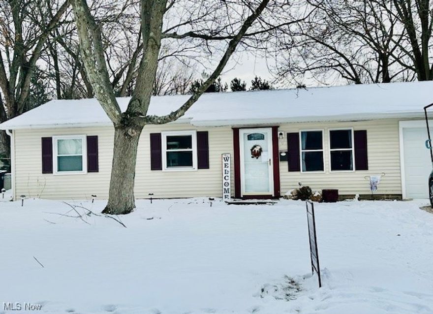 Welcome to this fabulous all one floor living Ranch home! Nice vinyl flooring throughout! Super spacious kitchen with breakfast bar seating and offers great space to add an island or more cabinets.  Refrigerator and dishwasher included. Kitchen, dining room and living room have an open floor plan concept!  Large bonus room in the back offers a combination of laundry room and additional space for an office/family room/game room etc! Back door leads to a fenced in spacious yard with a large concrete patio! Trampoline doesn't stay but the playset will, front basketball hoop and shed will convey! Three bedroom home approximately 1584 square feet!  Attached garage for your convenience and pull down storage! Central air, newer interior doors, newer windows and the furnace is about 2017 and the roof is about 11-12 years old! Come take a tour, fall in love and make the move!  Seller needs flexible closing.