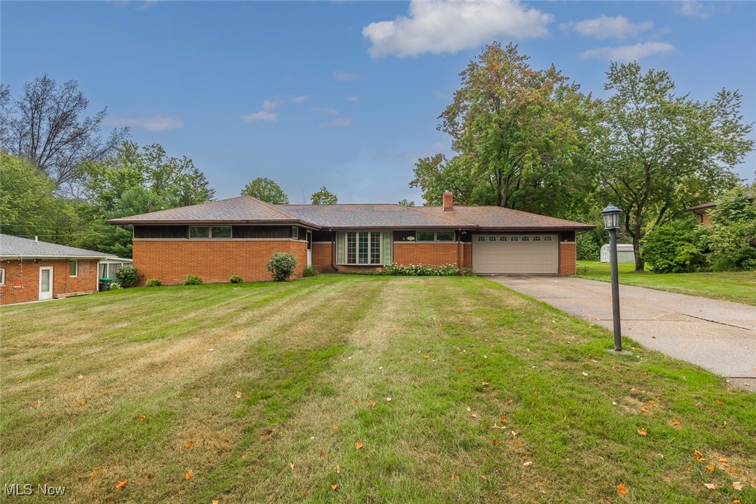 There is plenty of room in this desirable 4 bedroom, 2 full bath ranch offering over 1,800 SF and a 2.5 car attached garage on level half acre lot! The living room and famlily room are adjacent and feature an open space for either entertaining or casual family living. The spacious eat-in kitchen offers abundant cabinet space, all appliances, and it provides access to the enclosed sun porch, deck and back yard. All 4 bedrooms boast beautiful hardwood flooring, and the primary bedroom includes a private en-suite full bath. The second full bath is conveniently located in proximity to the other 3 bedrooms and the main living area. The first floor laundry room includes the washer and dryer, plus a laundry sink. There is plenty of storage space in the 4' concrete crawl space under the house which is accessed either from the interior or the exterior. Furnace and central air replaced 8/2025, Anderson replacement windows, updated electric panel, naturestone garage floor. Enjoy the low, low tax base, along with the fabulous city services and recreation facilities that Independence has to offer.