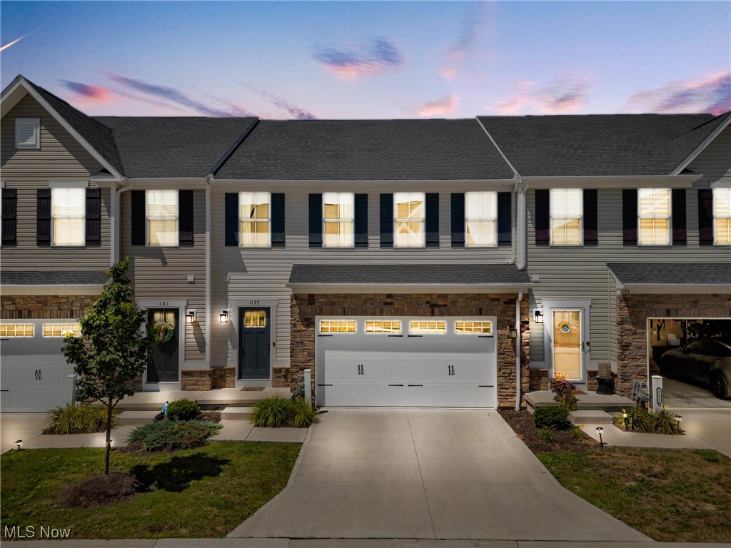 Welcome to your peaceful retreat in Beacon Park in Medina! This beautifully maintained 3-bedroom, 2.5-bathrooom townhouse built in 2021 offers the perfect blend of modern living and tranquil surroundings. Tucked away in a quiet community and backing up to a lush, HOA-maintained retention basin, you’ll enjoy incredible year-round privacy with a scenic, wooded view. Step inside to an open-concept main level featuring a half bath, spacious living area, and a bright, functional kitchen with tall, white cabinets, stainless steel appliances (all stay), and quartz countertops. Upstairs, you’ll find three well-sized bedrooms and two full bathrooms, including a generous primary suite with dual vanities and double walk-in closets. The primary suite also features a tiled, walk in shower with dual shower heads. The second-floor laundry room (washer/dryer stay!) adds everyday convenience, while a versatile loft space offers a cozy nook for an office or reading area. The partially finished basement provides the perfect rec room or gym space. Large unfinished storage area is all you need, or finish it to add additional living space. An attached two-car garage completes the package. Located just minutes from Medina’s historic Square and close to shopping, dining, and entertainment, this low-maintenance townhome checks all the boxes: modern updates, flexible living space, and a one-of-a-kind natural setting that feels like home. Schedule your private tour today and experience this hidden gem for yourself!