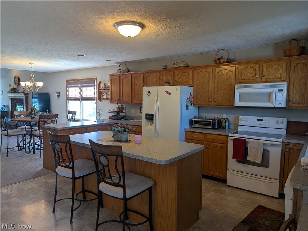 Photo of 15070 Woodsong Drive, Middlefield, OH 44062 (MLS # 5200544)