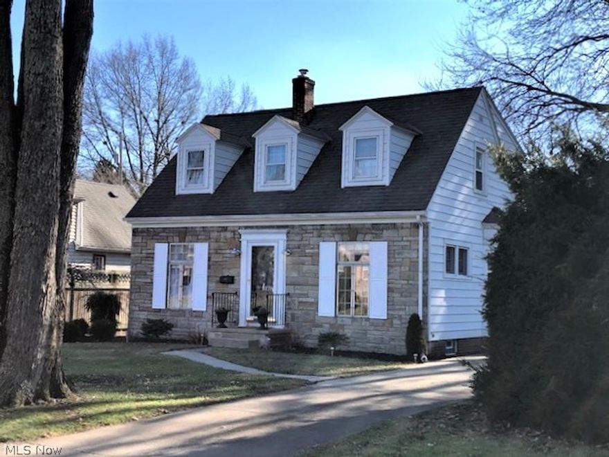 Nestled on this quiet- low traffic, cul-de-sac street off Harcourt Dr. is this adorable center hall Cape cod home with three bedrooms, 1.5 baths and a nicely finished lower level recreation room.  The main level offers a nice size living room with a wall of built-ins and shelving before heading out to the three season sun porch, formal dining room and a nice size kitchen with eating area, appliances and half bath.   The three bedrooms on the 2nd floor are nicely decorated and the full bath has been nicely updated.   The lower level has a finished recreation room ( also with a wall of built-ins) with fireplace, newer flooring and ceiling and bar area.  The kitchen has a back door that leads to the garage, partially fenced in yard, a Sq Ft. garden, rain barrel and compost for the Eco-conscious buyers.  The location is extremely convenient .... just minutes to downtown Akron, Highland Square, coffee shops, Whole Foods and a quick skip to Hardesty Park.   Send this to your buyers- its sure