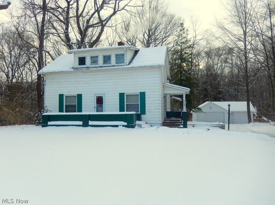 Historic Century Home just steps from town center & metro parks. Neutral carpet in living room & dining/parlor. Hardwood in kitchen dinette. Heated back porch, 2 car garage & workshop. Stunning views of the park. One year lease. No Smokers.