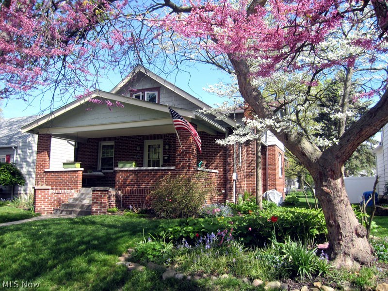 This is a must see home. Craftsman bungalow with 4 bedrooms, beautiful hardwood floors, windows have all been replaced, plus glass block in the basement. Wiring updated with new service box 150 amps. New granite counter in kitchen. First floor bedroom updated with bamboo floors and new fixtures. Second floor gutted and remodeled in 2008. Uniblock paver patio installed in 2005. Enjoy this eclectic neighborhood and all the amenities Cuyahoga Falls has to offer.