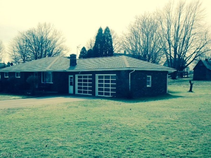 This beautiful brick one owner home is being sold with a second lot. The finished basement has a kitchen and a half bath. Look in the bedroom closets to see the beautiful hardwood floors. The roof and hot water tank were replaced a year ago. Windows & front door have been replaced. Come see this home before its gone.