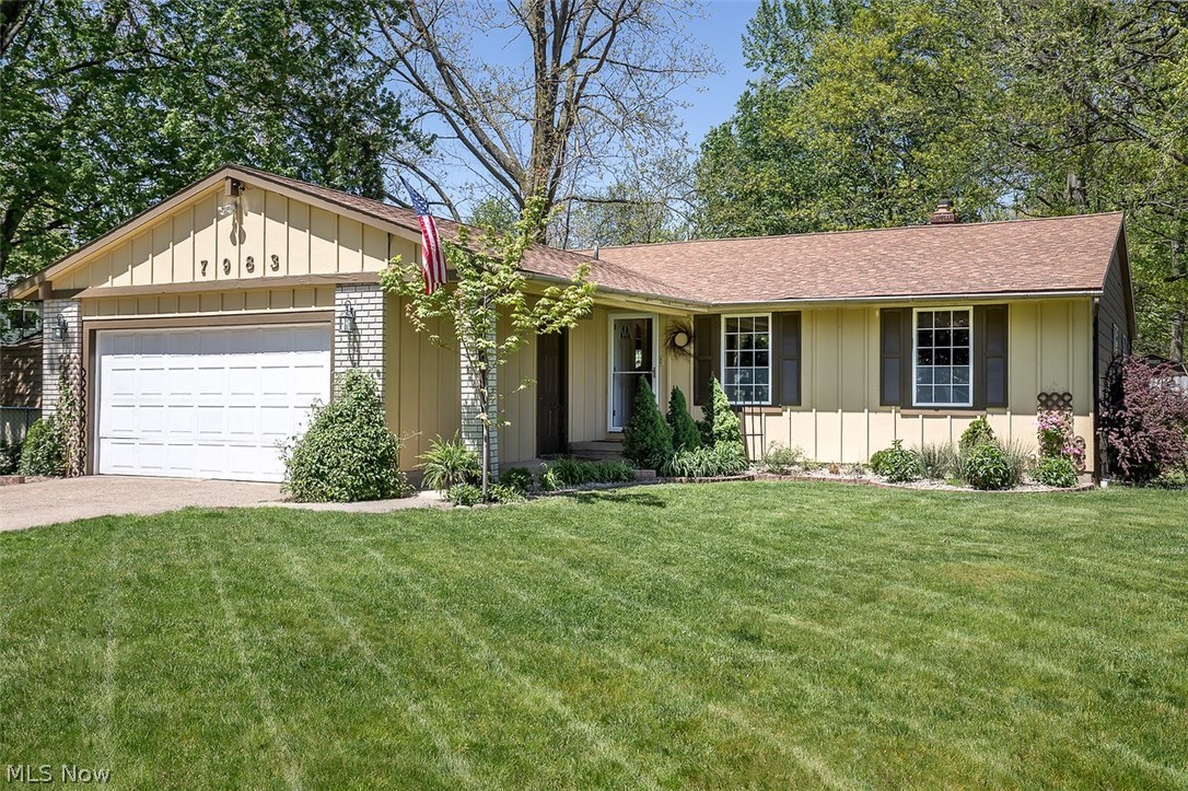 Located conveniently near shopping, Lake Erie, and minutes from the highway, this sharp, open-concept, three bedroom ranch with a finished lower level is a must-see! This modern style ranch boasts newer wood flooring, newer lighting, neutral paint, vaulted ceilings, a gorgeously updated kitchen creme glazed cabinetry with crown molding, stainless steel appliances, and views of hearth room or dining room fireplace. The spacious master suite features an en-suite bathroom with plenty of storage space. The finished lower level has bar, recreation room, storage, and laundry room. Other features of this home include an attached two car garage, and a two-tier newer deck with a gazebo that overlooks the private backyard with shed. Neighborhood community with sidewalks close to Mentor Beachpark. Welcome Home!